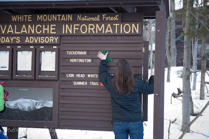 A woman updating the avalanche forecast